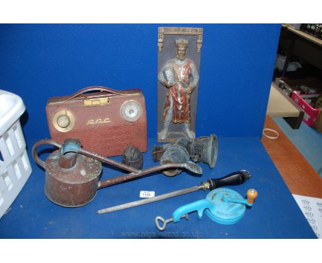An old G.E.C Radio, grenade, early cycle lamp, bean slicer, etc.