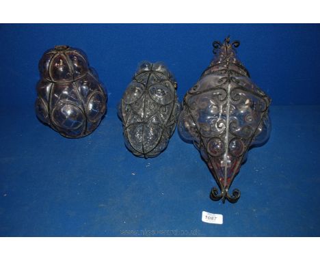 Three glass and metal Light Shades.