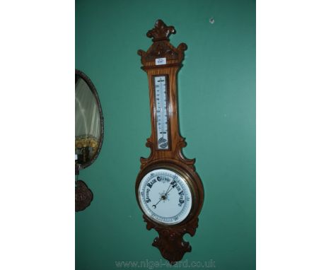 A Banjo aneroid Barometer/thermometer.