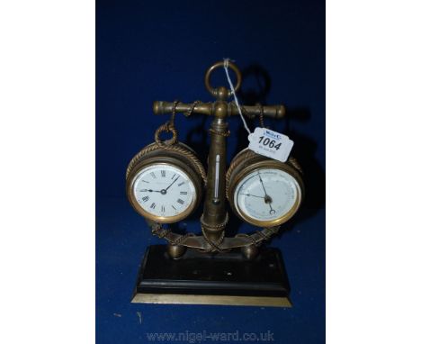 An antique nautical brass Clock, Thermometer and Barometer mounted on a slate and brass plinth, by Reynoldson & Son of Hull, 
