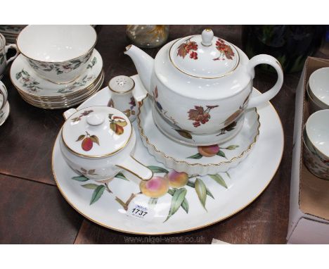 A quantity of Royal Worcester 'Evesham' china including large serving plate, lidded sauce pot, pepper pot, flan dish and teap
