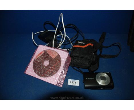 A Canon Powershot Digital Camera, leads and software.