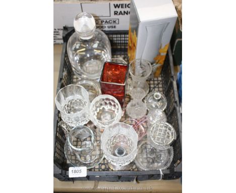 A quantity of glass including Dartington glass decanter, bud vases, bell, Caithness bud vase, ring trees, red studio vase, et