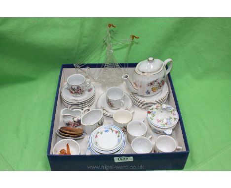 A small quantity of miniature china including cups, saucers, teapot etc and a spun glass Model of a tall ship.