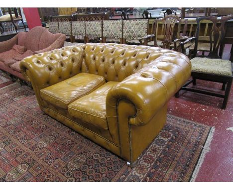 Mustard 2 seater button-back Chesterfield sofa - H: 69cm x L: 175cm x D: 110cm