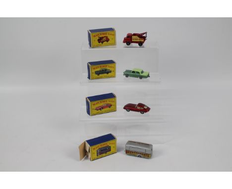 Matchbox - 4 x boxed vehicles, Thames Wreck Truck # 13, Austin Cambridge with silver plastic wheels, Jaguar E Type # 32 and M