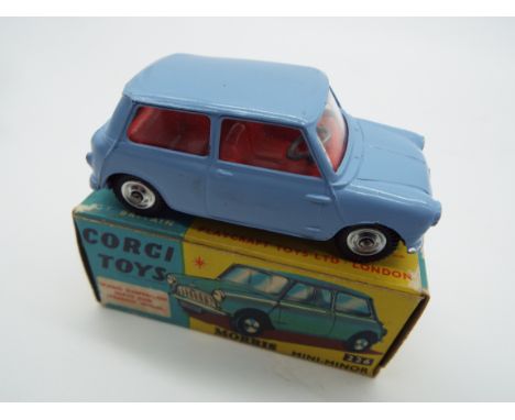 Corgi - a diecast model Morris Mini-Minor, pale blue body and chassis, red interior, steering wheel, spring suspension # 226,