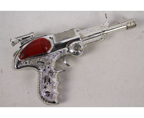 Lone Star - Space Outlaw - Toy Ray Gun. Appears to be in excellent condition given it's age, minor marks and wear and firing 