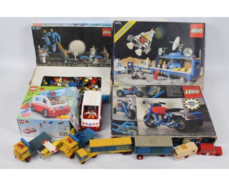 Lego - 3 x vintage Lego boxed sets, Moon Landing set dated 1975, Space Centre dated 1981, Motorcycle set # 857 dated 1979. Al