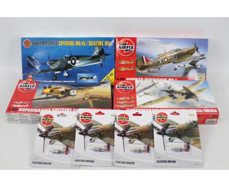 Airfix - Four boxed 1:48 scale Airfix Spitfire &amp; Hurricane plastic model kits, with four carded Airfix AF1004 Electric Mo