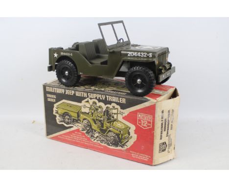 Cherilea Toys - A boxed Military Jeep from the Big 12 series # 2637. The model appears in Very Good condition with light sign