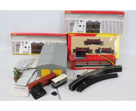 Hornby - A collection of OO gauge items including an unopened Track Pack C # R8017, a boxed EWS livery Coal Wagon pack # R636
