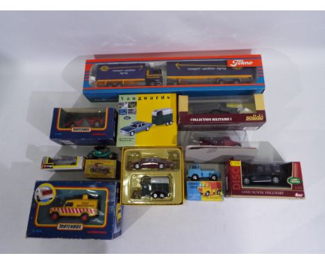 Tekno, Corgi, Matchbox, Burago, DelPrado, Lledo, Solido, Redbox - 10 x boxed die-cast model vehicles - Lot includes a 1:50 sc