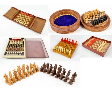 A 20th century French leather travelling chess set with plastic pieces, the case marked "Du Nain Blue Paris", a treen travell