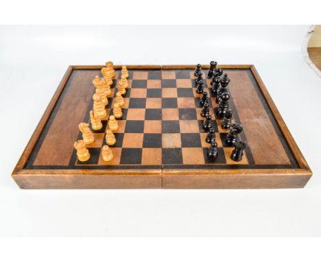 A set of 19th century French rosewood and boxwood St George pattern chess pieces, height of king 10cm, a set of backgammon pi