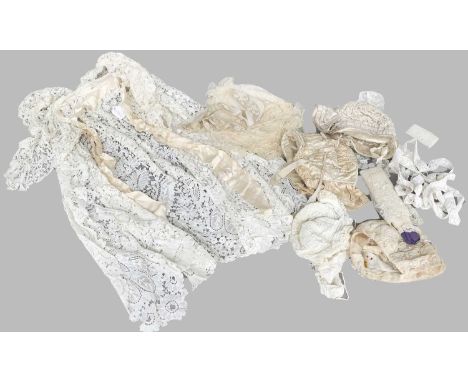 19th Century Baby Bonnets, comprising two similar cream silk bonnets with decorative wriggle work embroidery, silk ruffled tr