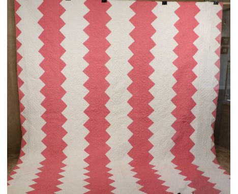 Late 19th Century Pink and White North Country Zig Zag Strippy Quilt, heavily hand quilted overall with pink to the reverse, 