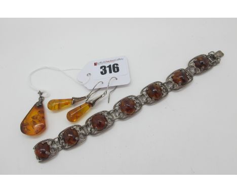 A Panel Bracelet, with cabochon highlights, to snap clasp, 18.5cm long; together with an amber coloured pendant and a pair of