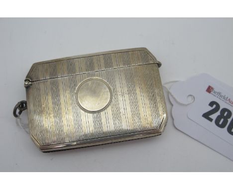 A Large Hallmarked Silver Vesta Case, JR, Birmingham 1923, of rectangular form with canted corners, allover engine turned, wi