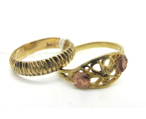 A 9ct Gold Patterned Band, of textured finish (finger size K) (2.2grams); together with a filigree style ring, of pierced des