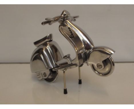 Chrome Vespa scooter