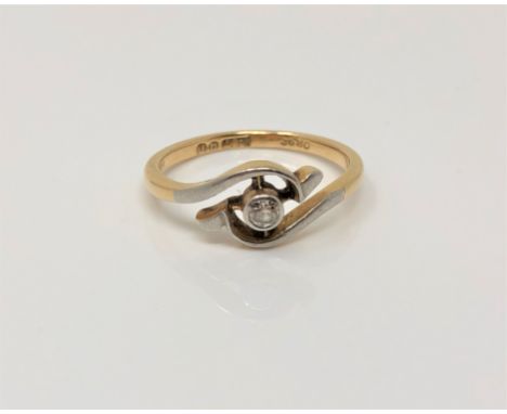 An 18ct gold solitaire diamond crossover ring, size K CONDITION REPORT: 2.4g