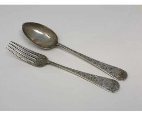 An ornate silver fork and spoon, Birmingham 1901