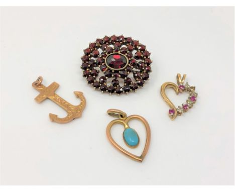 Two gold pendants set with turquoise/ruby and diamond, a gold anchor pendant and a gilt brooch. (4)