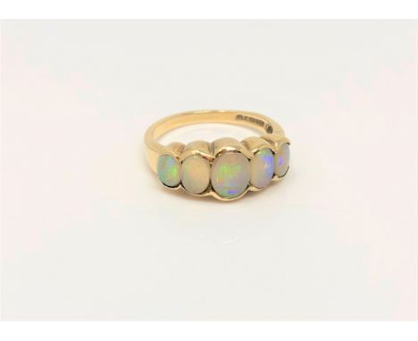 A 9ct gold five stone opal ring, size N CONDITION REPORT: 3.4g