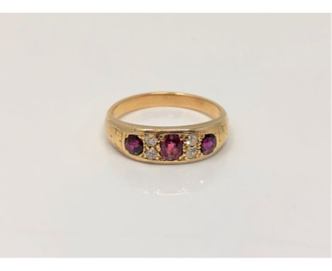 A ruby and diamond set ring, size O CONDITION REPORT: Apparently unmarked. 4g
