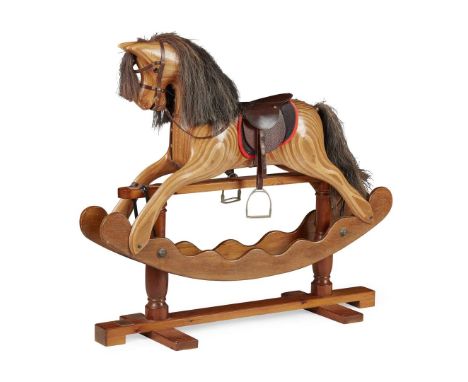  PLATFORM ROCKING HORSE, BY IAN ARMSTRONG MODERN with carved laminated wood body, horsehair mane and tail, leather tack and s