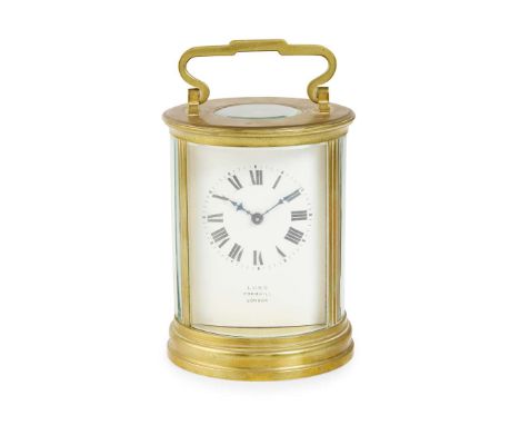  FRENCH BRASS OVAL CARRIAGE CLOCK, RETAILED BY LUND, CORNHILL, LONDON LATE 19TH CENTURY with white enamel curved rectangular 
