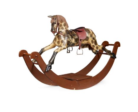  VICTORIAN ROCKING HORSE LATE 19TH CENTURY dapple grey with horse hair mane and tail, leather saddle and tack, on large bow r
