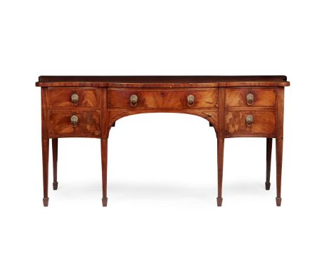  GEORGE III MAHOGANY SERPENTINE SIDEBOARD LATE 18TH CENTURY the crossbanded serpentine top above a crossbanded central frieze