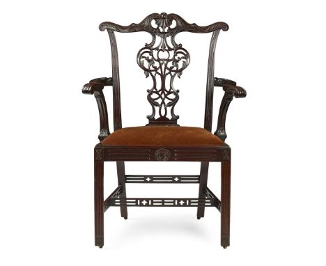  CHIPPENDALE REVIVAL MAHOGANY ARMCHAIR 19TH CENTURY of generous proportions, the shaped and carved top rail centred by a pier