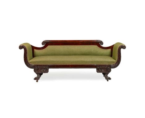  IRISH REGENCY MAHOGANY SOFA 19TH CENTURY the serpentine shaped back with carved acanthus scrolls, above a long padded seat a