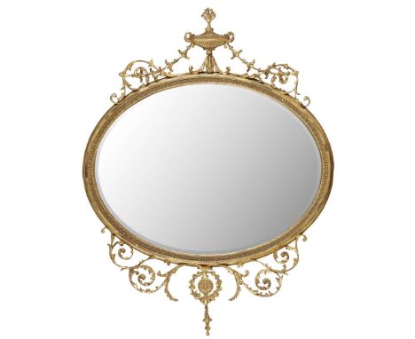  GEORGE III STYLE GILTWOOD AND GESSO MIRROR 19TH CENTURY the oval bevelled mirror plate within an egg-and-dart moulded frame,