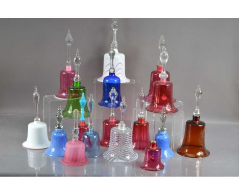 A remarkable collection of seventeen Victorian glass handbells various colourways including cranberry, clear, blue, green, et