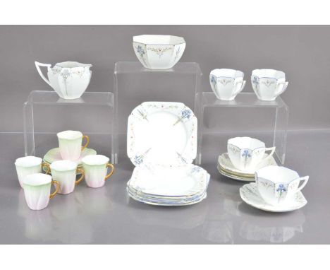 A Wilman "Foley China" coffee set and a Shelley Art Deco style teaset, the Foley porcelain coffee cups and saucers in a delic