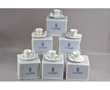 A set of six Lladro demitasse animal puppy and kitten coffee cups and saucers, also moulded with doves, butterlies, frogs etc