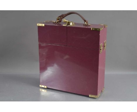 An unusual prototype lacquer wine carrying case or hamper, purple lacquer with leather carrying handle and brass corners and 