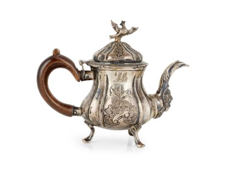 unmarked, circa first half 19th century, the cast body of baluster form, fluted body with embossed floral detail and engraved