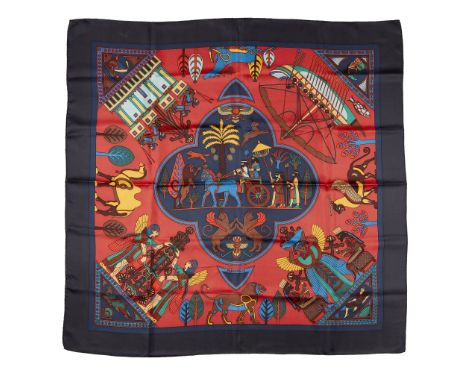 the first cream with multi-coloured coin and chatelain motif; the second with navy and maroon Egyptian motifs(90cm x 90cm)