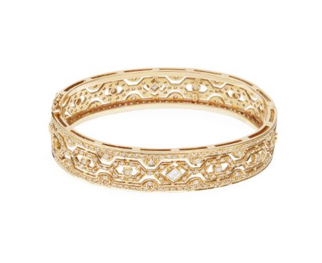 of hinged design with pierced geometric detail, set throughout with eight-cut diamonds, collet set with larger eight-cut, rou