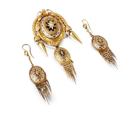 the brooch of oval scrolling form with pendant drops, applied foliate detail, the central pearl in a blue and while enamel bo