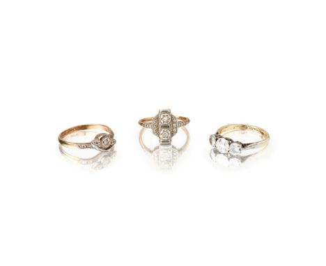 to include a three stone old round-cut diamond set ring; stamped 18ct PLAT; a single stone eight-cut diamond set ring, stampe