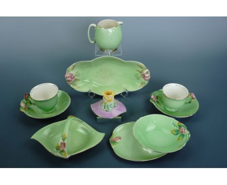 Royal Winton green ground blossom pattern table ware and a floral chamber stick