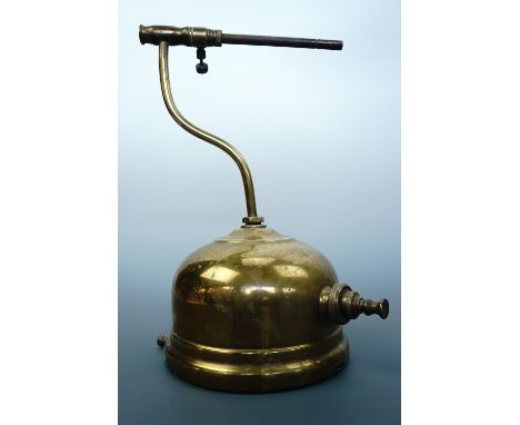 A brass Tilley lamp