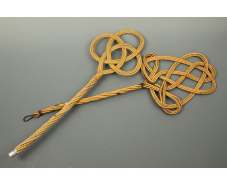 Two cane carpet beaters