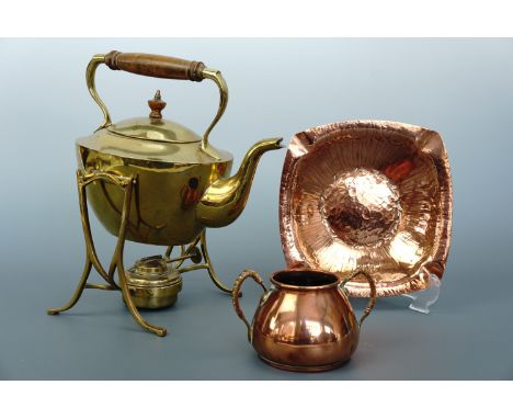 An early 20 th century brass spirit kettle and stand by J Soutter and Sons, together with a copper sucrier by Carl Deffner an